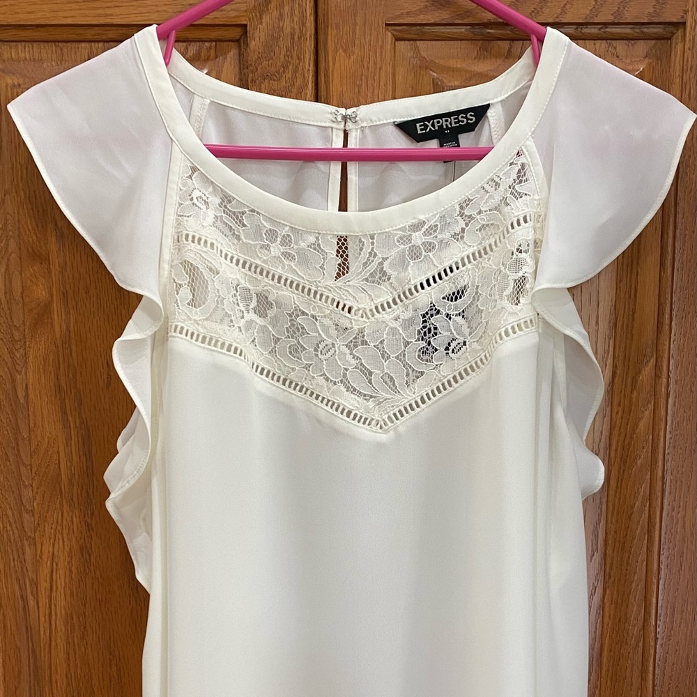 NWT. Express blouse. Size medium. White with lace.